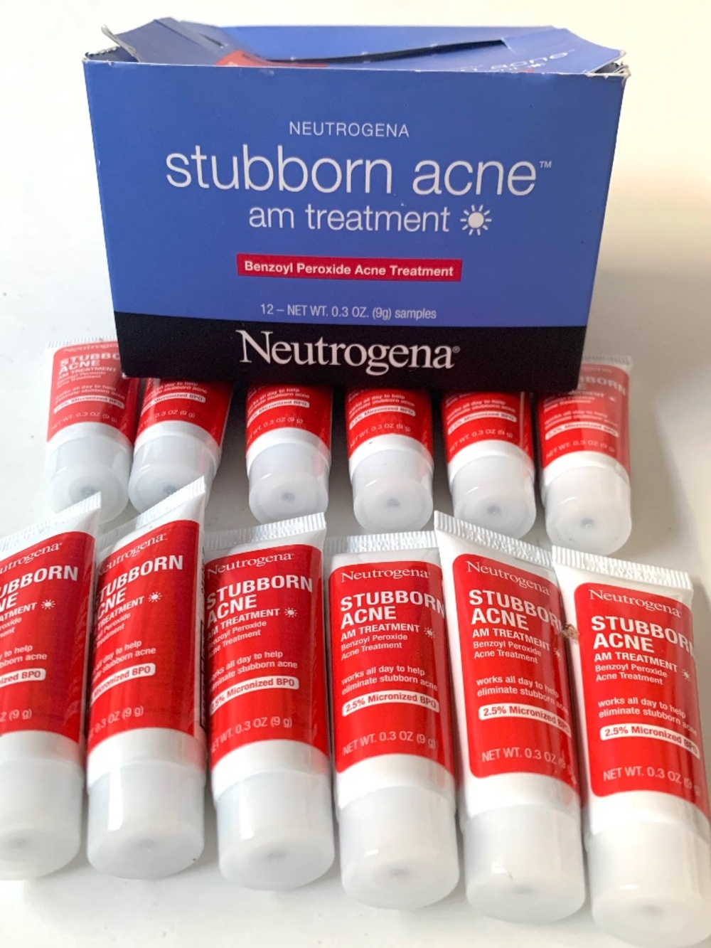 12 lot Neutrogena  stubborn acne am treatment Lotion .3 fl. oz travel